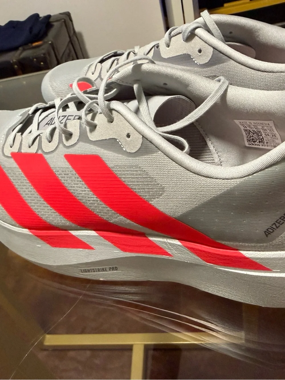 adidas Adizero EVO SL Running Shoes - Light Gray with Bright Red Accents
